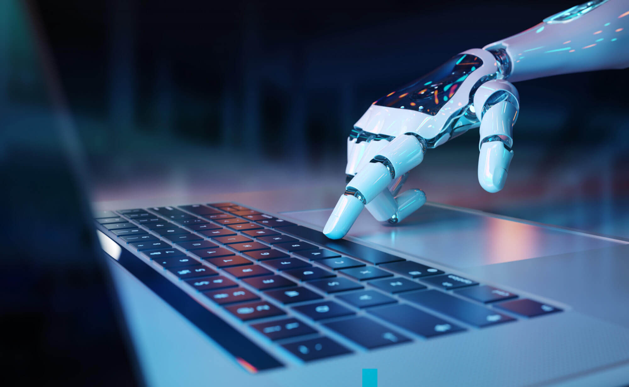 Robotic hand pressing keyboard laptop
